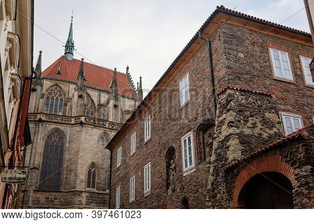 Medieval Stone St. Bartholomew´s Church, Gothic Cathedral At The End Of Narrow Street In Autumn Day,