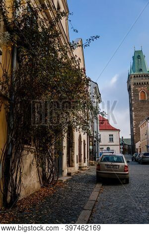 Narrow Picturesque Street With Colorful Buildings In Old Historic Center In Kolin, Gothic Cathedral 