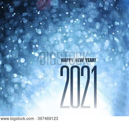 New 2021 year greeting text on night snowfall abstract 
background.