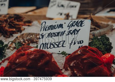 Close Up Of Price Tag On Premium Grade St Austell Bay Mussels On Sale At A Market In London, Uk, Sel