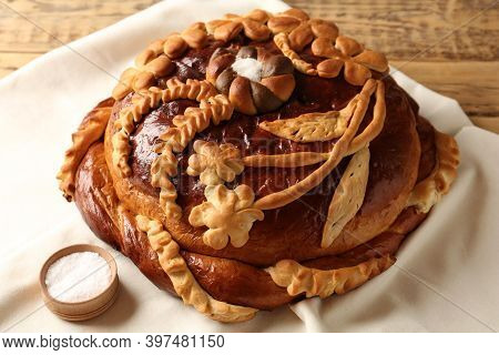 Korovai On Tablecloth, Closeup. Ukrainian Bread And Salt Welcoming Tradition