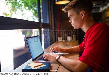 Business Man Website Content Creator Online Browsing Via Laptop Computer While Sitting In Coffee Sho