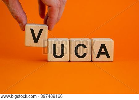 Vuca Symbol. Wooden Cubes With Word 'vuca - Volatility, Uncertainty, Complexity, Ambiguity'. Beautif
