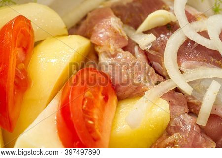 Pork Meat, Potatoes, Tomatoes And Onions, Ready To Bake