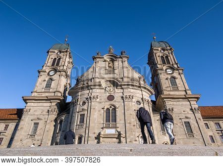 Einsiedeln, Switzerland - November 25, 2020: The Benedictine Abbey Of Einsiedeln With Its Mighty Bas