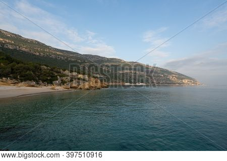 Paradise Idylic Coelhos Beach With Turquoise Water In Arrabida Park, In Portugal
