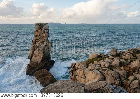 Peniche Sea Cliffs With Berlengas Island On The Background With Atlantic Ocean, In Portugal