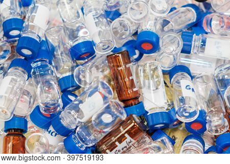 Dirty Used Chromatographic Vials With Blue Caps. Hplc Analysis At Analytical Chemistry Laboratory. D