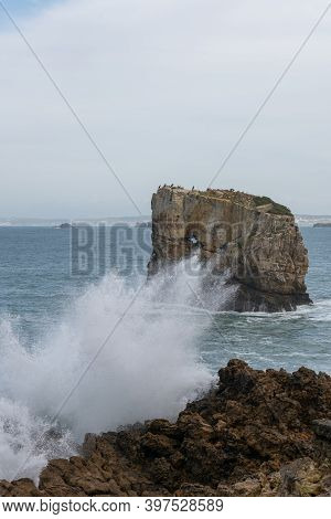 Sea Cliffs In Papoa Cabo Carvoeiro Cape In Peniche, Portugal
