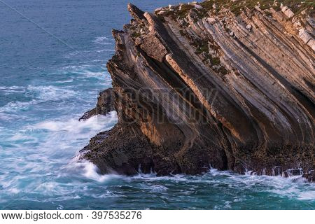 Cliffs Beatiful Rock Details In Baleal Island With Atlantic Ocean Crashing Waves In Peniche, Portuga