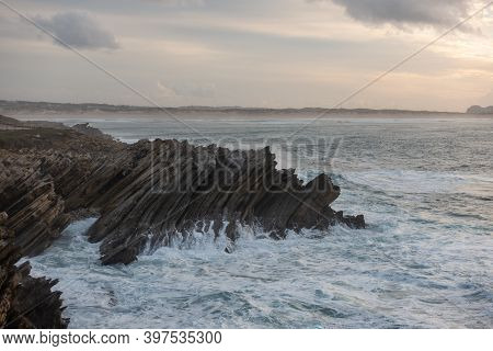 Cliffs Beatiful Rock Details In Baleal Island With Atlantic Ocean Crashing Waves In Peniche, Portuga
