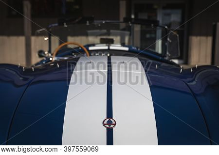Placerville, USA - November 25, 2020: Classic rare American muscle car, convertible vintage blue 1967 Ford Shelby Cobra 427