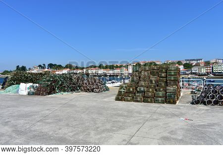Mugardos, Spain. May 30, 2020. Harbour And Fishing Village With Colorful Houses And Boats With Blue 