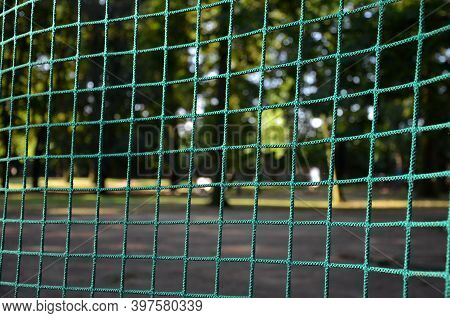 Public Multifunctional City Playground With Tartan Surface In The Park Is Used To Play Basketball Fo