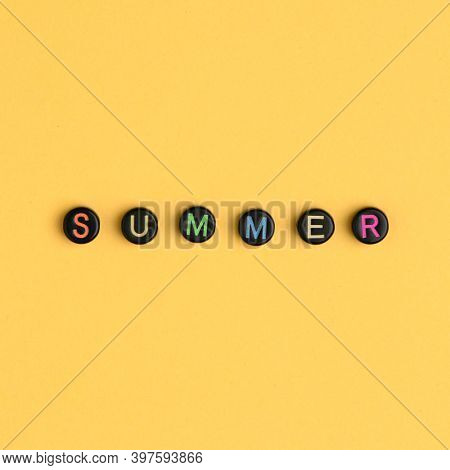 Summer word beads alphabet yellow background