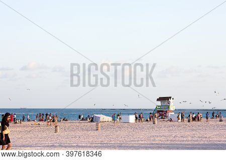 Miami Beach, Florida, United States - March 23, 2012: People Enjoying The Evenig At South Beach.