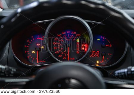 Novosibirsk, Russia - November 26, 2020: Mazda Cx7, New Car Interior Details. Speedometer, Tachomete