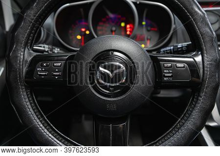 Novosibirsk, Russia - November 26, 2020: Mazda Cx7, Dashboard, Player, Steering Wheel With Logo And 