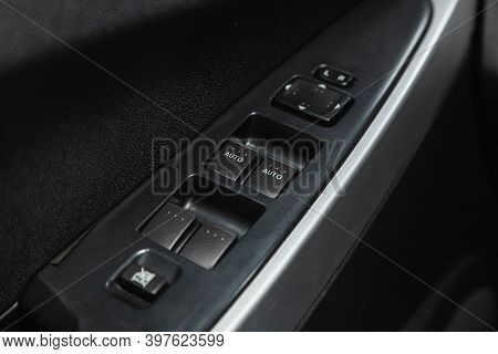 Novosibirsk, Russia - November 26, 2020: Mazda Cx7, Close-up Of The Side Door Buttons: Window Adjust