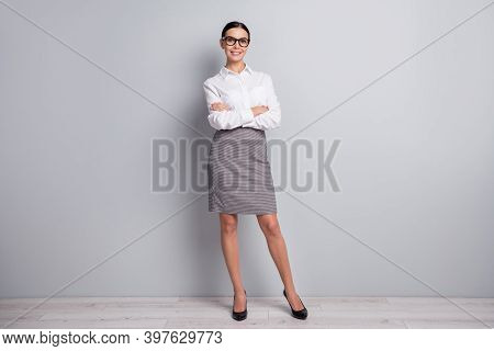 Full Length Photo Of Self-assured Girl Crossed Arms Wear Glasses White Shirt Mini Skirt Isolated Gre