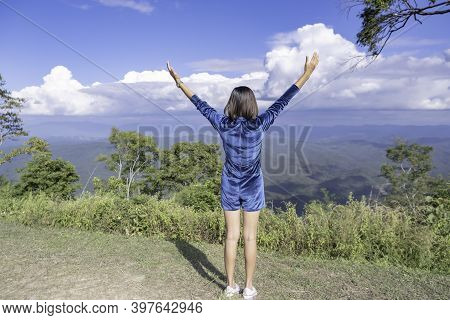 The Image Behind The Women Raise Their Arms Looked At The Mountains And Cloud At Doi Samer Dao , Nan