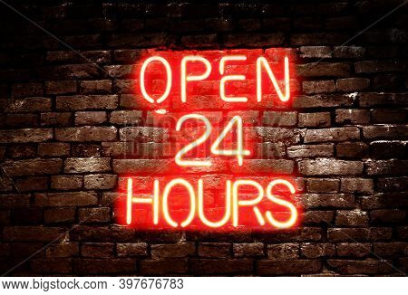 Open 24 Hours Red Neon Sign On Brick Wall Background