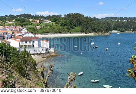 Small Fishing Village With Boats And Beach. Redes, Coruña, Galicia, Spain.
