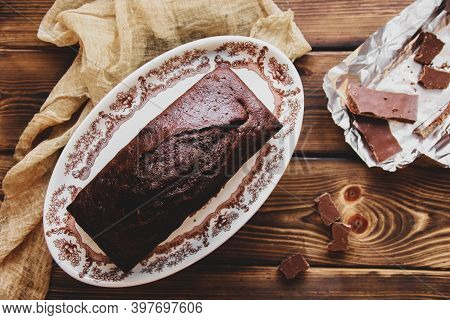 Wet Chocolate Cake With Chocolate Icing. Chocolate Fudge. Homemade Baking. Chocolate Cake On Wooden 