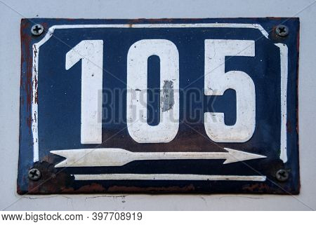 Weathered Grunge Square Metal Enameled Plate Of Number Of Street Address With Number 105