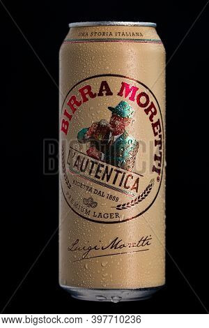 Birra Moretti, A Premium Lager Beer With Water Droplets On Black Background. Studio Photo Shoot In B