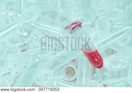 Used Microcentrifuge Eppendorf Tubes With Red Fluid Or Blood After Analysis. Pcr Test. Biochemical O