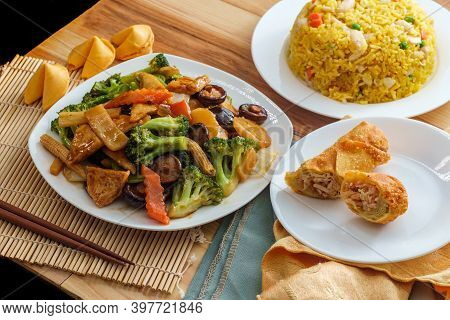 Buddha's Delight Sauteed Mixed Chinese Vegetables With Tofu Served With Chicken Fried Rice And An Eg