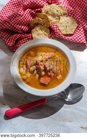 Simple Slow-cooker Ham And Cannellini Bean Soup With Multigrain Hexagon Crackers For Dipping
