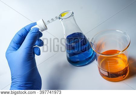 Close Up Glass Measuring Beaker For Science Experiment Background