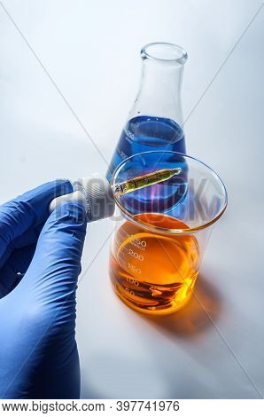 Close Up Glass Measuring Beaker For Science Experiment Background