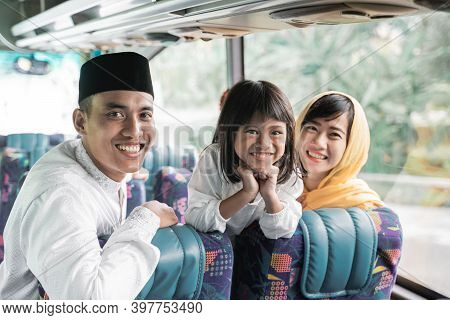 Muslim Holiday Trip Riding A Bus Together With Family