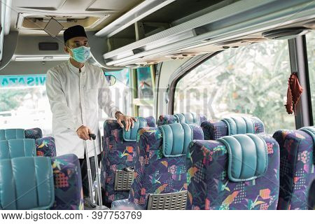Male Muslim Travel By Bus During Pandemic