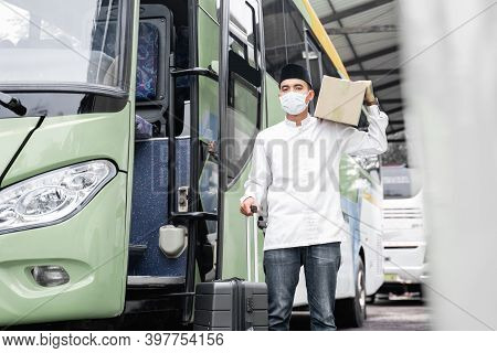 Male Muslim Travel By Bus During Pandemic