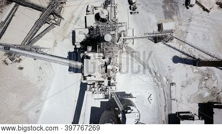 Large Quarry Stone Sorting Conveyor Belts And An Open Pit Mine.