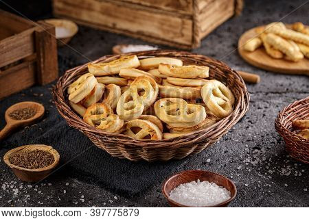 Homemade Mini Pretzels With Cummin Seed In Little Wicker Basket