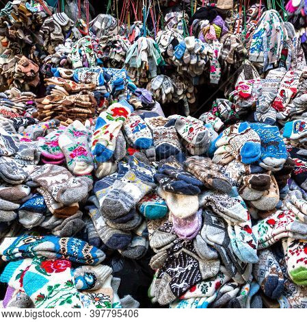 Moscow, Russia, June 16, 2019: A Large Pile Of Woolen Socks. Wool Products In The Clothing Market.
