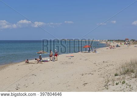 Vitino, Saki District, Crimea, Russia - July 24, 2020: Uncrowded Sandy Beach Near The Resort Village