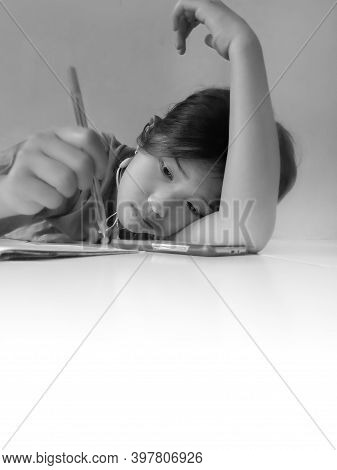 Cianjur, West Java, Indonesia, December 3, 2020, Portrait of a girl leaning on her hand