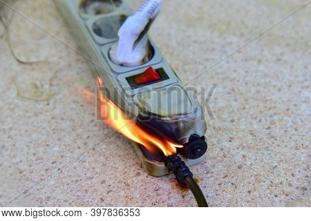 Outlets With Switche Caught Fire In Room. Overloaded Electrical Current Or Short In Device From Many