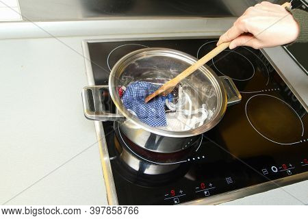 The Detail Of Boiling Of Home Made Provisional Textile Masks To Remove All The Bacteria And Viruses 