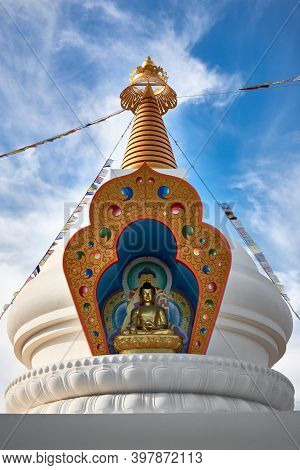 A Vertical Shot Of The Buddha Statue Of Karma Guen Under The Sunlight In Andalusia, Spain