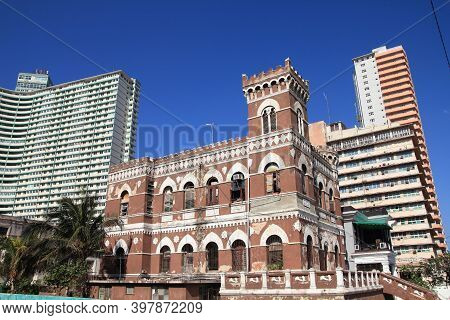 Havana City, Cuba. Old Residential Building In Vedado District With Contemporary Architecture In Bac