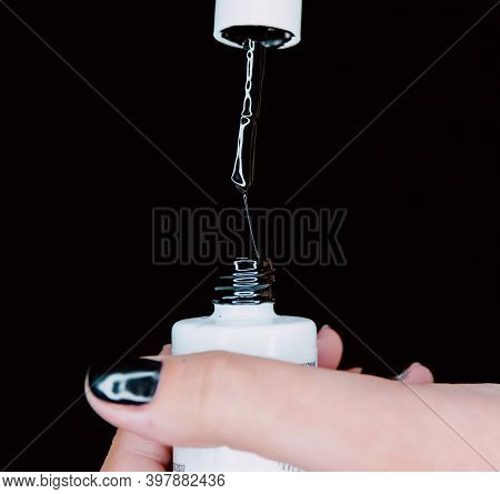 Black Nail Paint Brush With Black Background