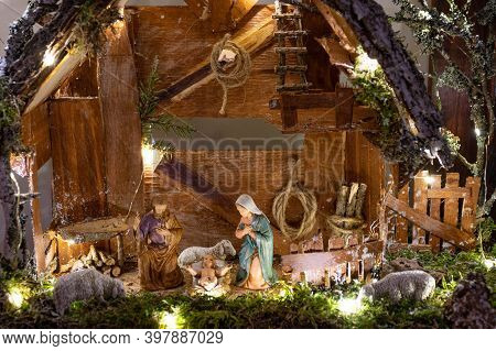 Beautiful Christmas Nativity Scene With Holy Family, Italian Typical Presepio In A Handmade Wooden O
