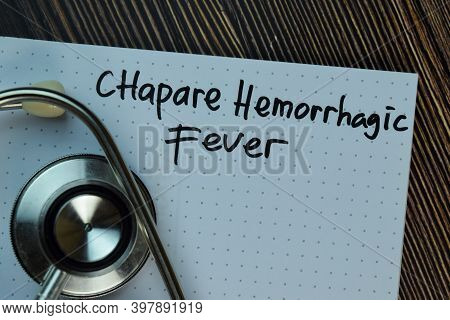 Chapare Hemorrhagic Fever Write On A Book Isolated On Wooden Table. Medical Or Healthcare Concept